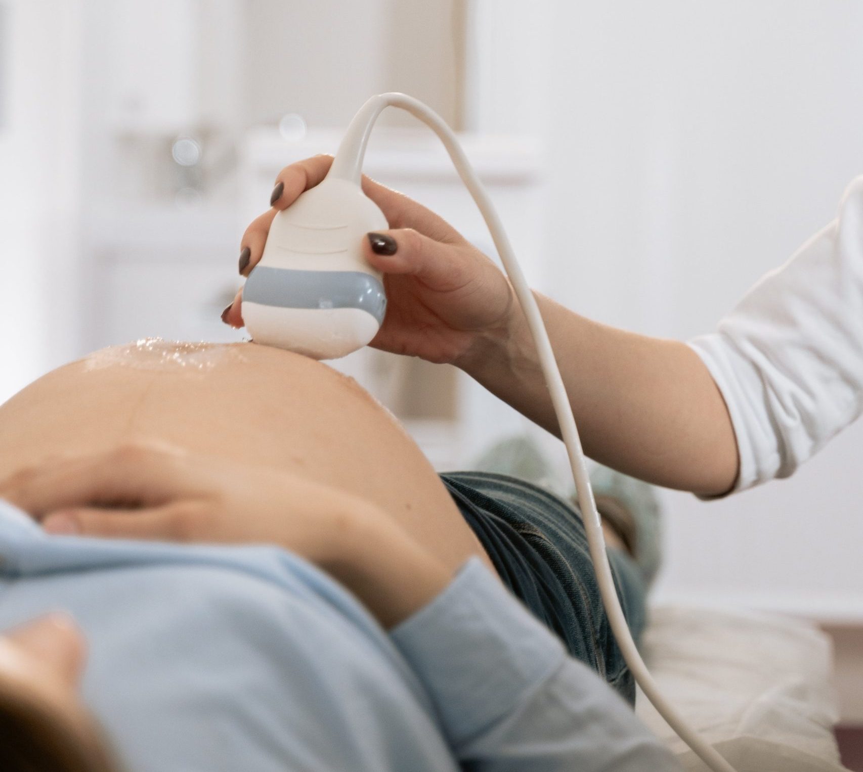 Expectant mother receiving care exam